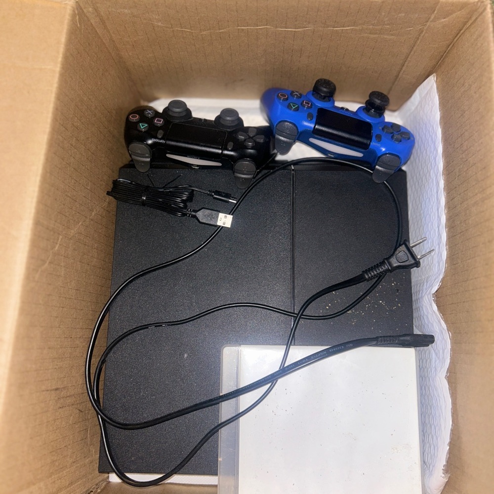 PS4 original with Dual Controllers - Black and Blue